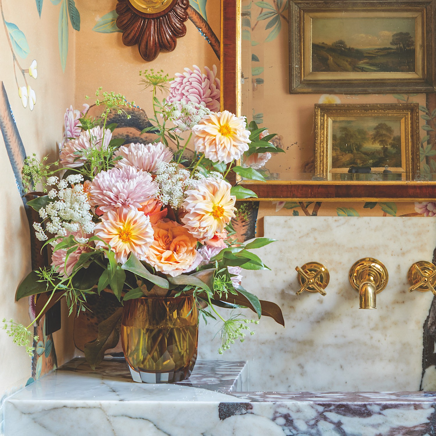 Suzanne Graves arrangement of pink chrysanthemums and peach sherbet dahlias in the gentleman's dressing room