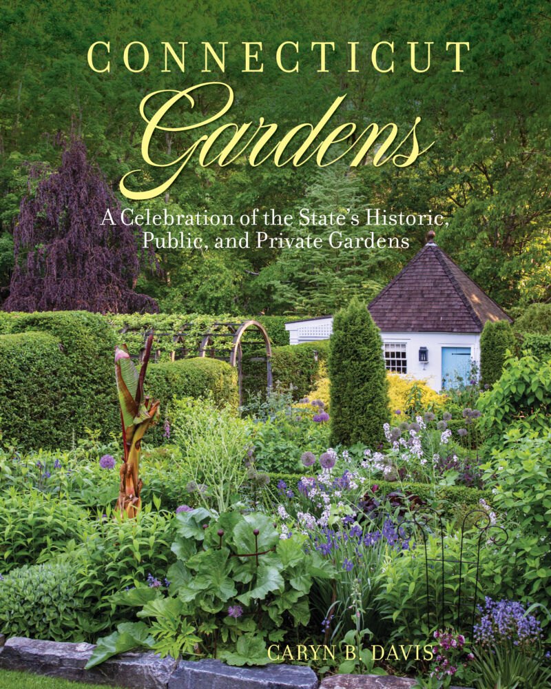 A fluffy green garden with a white garden shed grace the cover of Connecticut Gardens.