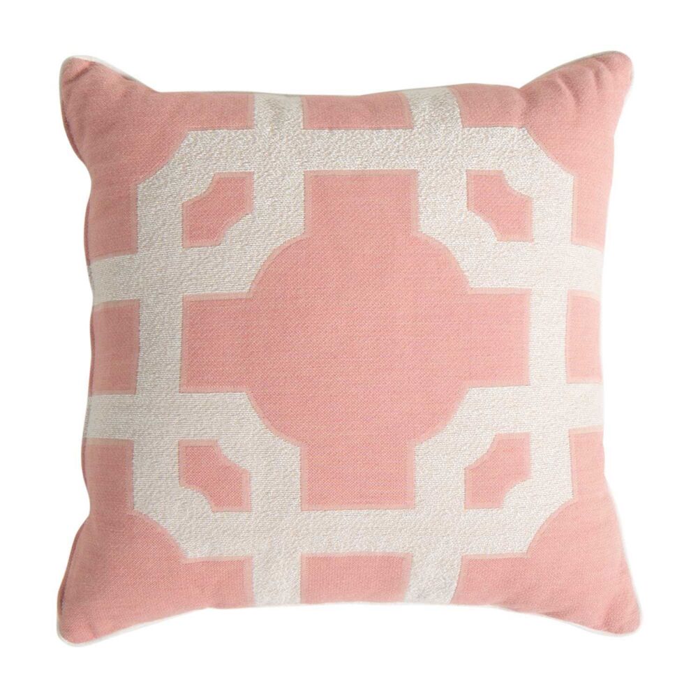 A pink pillow with a geometric design.