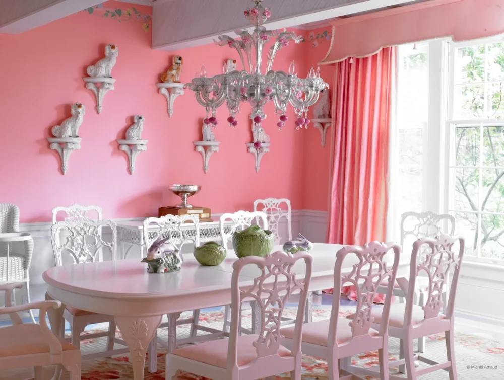 Pink and white dining room in Mackinac Island, Michigan, designed by Carleton Varney.
