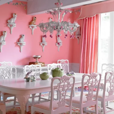 Pink and white dining room in Mackinac Island, Michigan, designed by Carleton Varney.