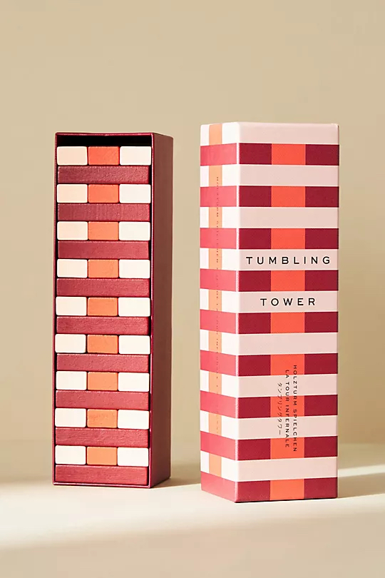 Printworks tumbling tower game with red and burgundy blocks and box