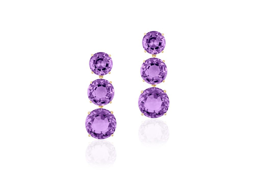 Purple bejeweled earrings.