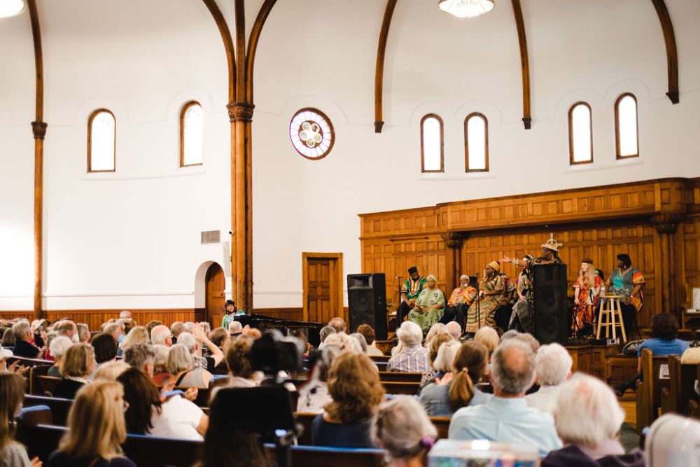Plantation singers sing at the circular congregational church.
