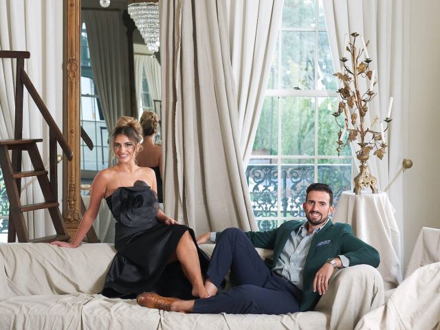 Portrait of Jewel and Vincent Centanni of Ivy Residential Concepts in space with furniture draped in dropcloths.