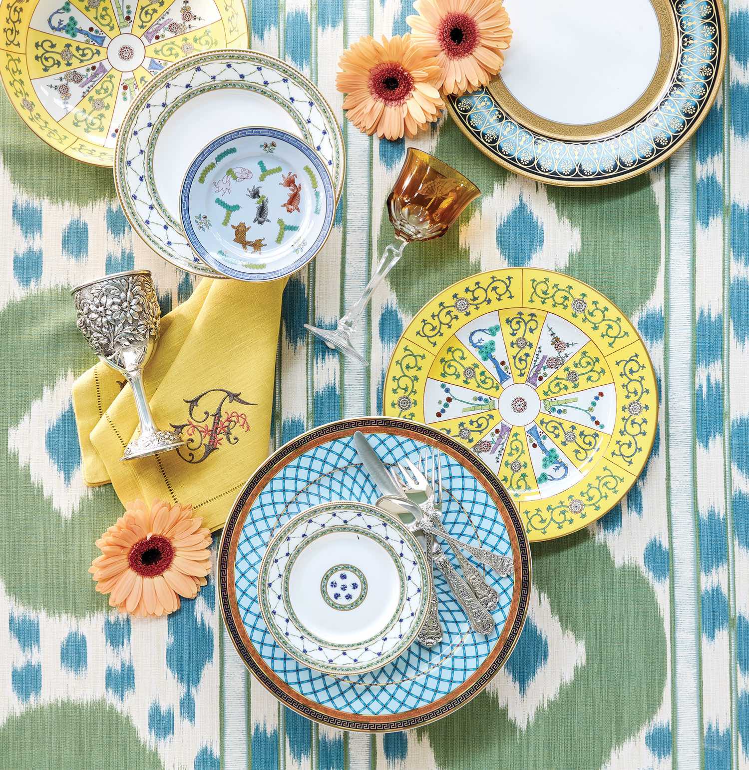Alfresco dining calls for a summertime setting full of bright color and pattern.