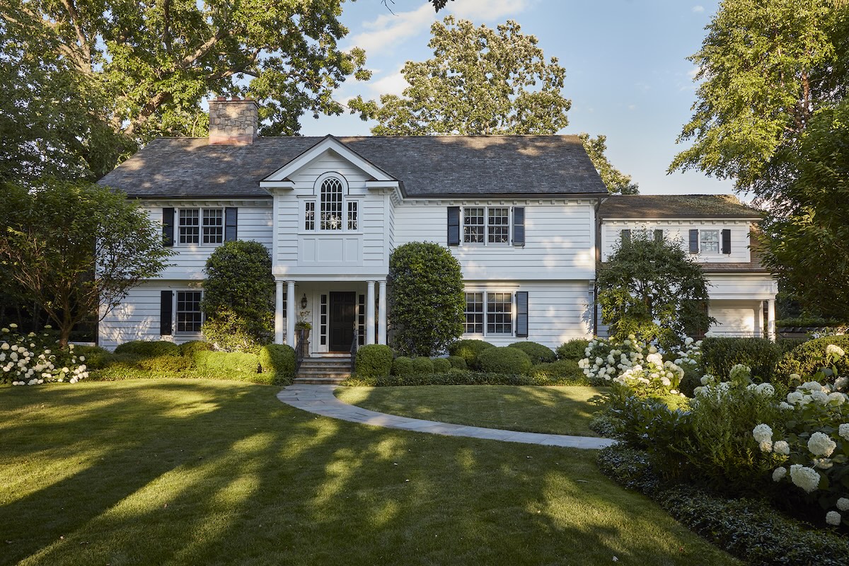 Exterior of a white classic home.